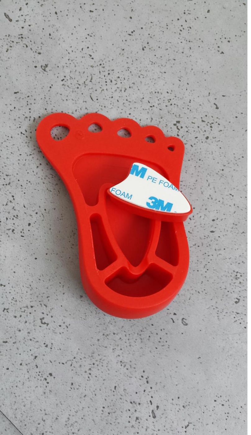 Bloque-porte Finger Alert rouge posé au sol